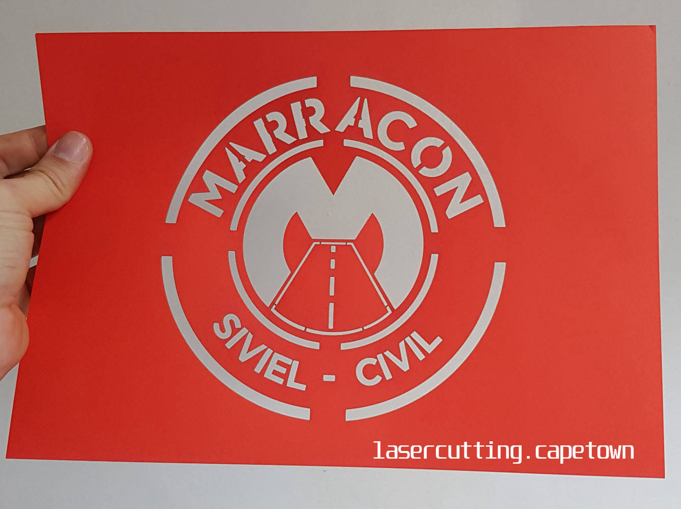 Laser cut stencil for spray painting